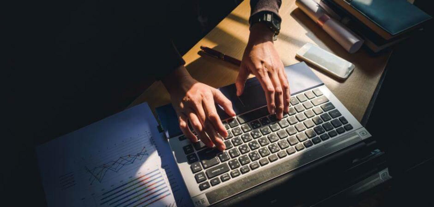 man using laptop